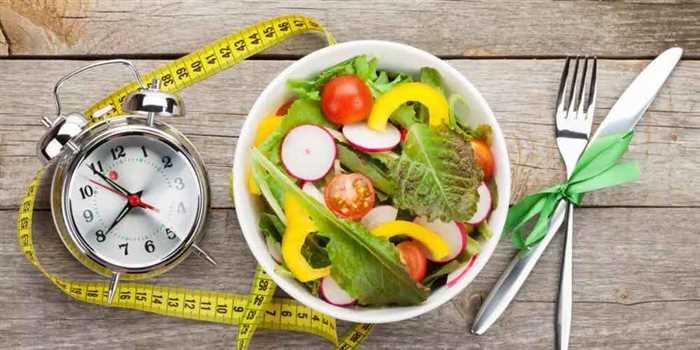 How Intermittent Fasting Boosts Metabolism and Brain Function Naturally Intermittent fasting concepts showing a clock and healthy foods that boost metabolism and brain function